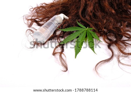 cannabis leaf hair lotion, hair care .
 Royalty-Free Stock Photo #1788788114