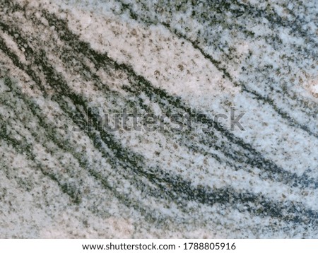 Close-up photo of the beautiful marble patterned surface. The abstract marble background texture for decorative design.