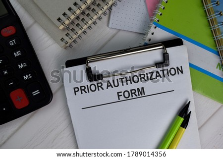 Prior Authorization Form write on paperwork isolated on office desk.