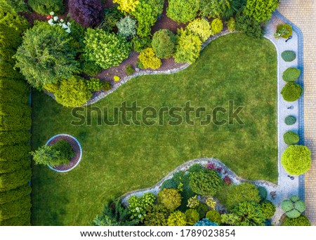 Beautiful Residential Mature Garden Aerial Top View Landscaping Industry Theme. Royalty-Free Stock Photo #1789023854