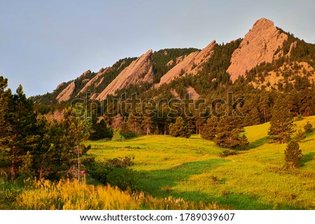 A sunrise photo of the Flatirons at Chautauqua Park in Boulder, Colorado Royalty-Free Stock Photo #1789039607