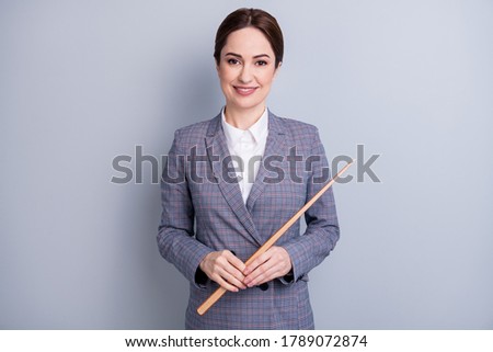 Photo of attractive confident lady good mood experienced teacher occupation look camera online internet lesson hold pointer wear plaid suit jacket shirt isolated grey color background