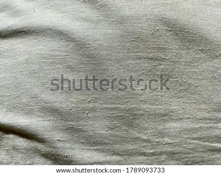 Background Of Crumpled Dense Fabric