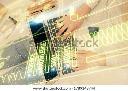 Double exposure of woman hands working on computer and education theme hologram drawing. Top View. Science concept.