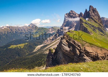 Panoramic view of Odle group (Geislergruppe, gruppo delle odle) from Alp Seceda in Dolomites UNESCO World Heritage on summer day in Val Gardena (Gröden), South Tyrol (Südtirol, Alto Adige), Italy Royalty-Free Stock Photo #1789240760