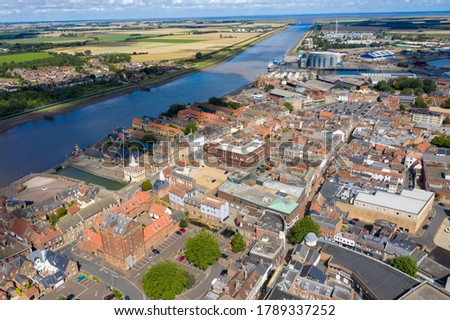 Aerial photo of the beautiful town of King's Lynn a seaport and market town in Norfolk, England UK showing the main town centre along side the River Great Ouse on a sunny summers day 