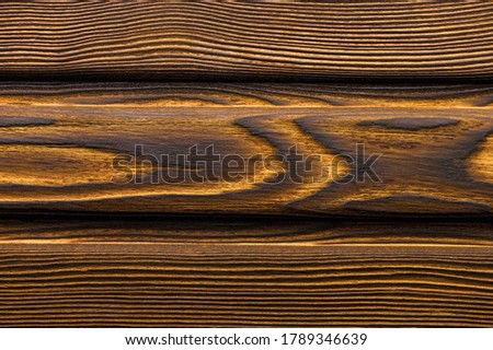 Vintage wood texture with knots. Closeup topview for background or artworks.