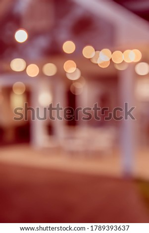 Vintage tone abstract blur image of Restaurant or Cafe in night time with bokeh for background usage .