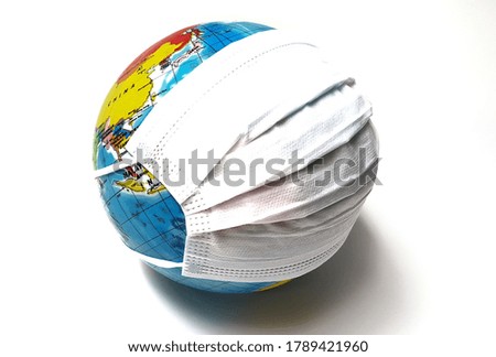 planet earth with face mask protect,world medical concept,coronavirus epidemic in the world,global quarantine concept,earth in medical mask isolated on white background.