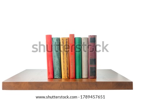 Table top with books on white isolated background