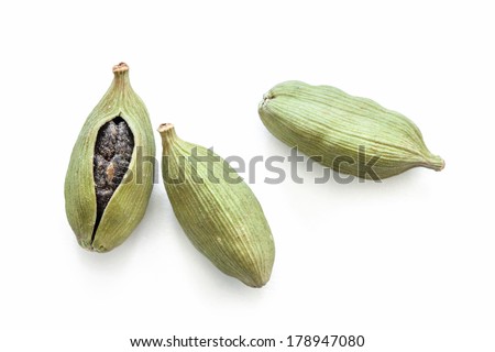 Close up of cardamon pods on white background Royalty-Free Stock Photo #178947080