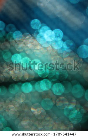 Bokeh effect background in blue and turquoise colours