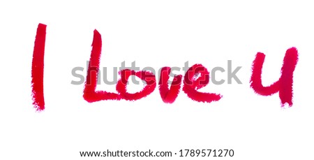 romantic text kiss written by lipstick trace red on white background