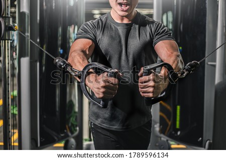 Asian men exercise chest workout on bench press cable machine lifestyle of man for fitness Health.Metaphor Fitness and workout concept exercise Health lifestyle muscle body your health Royalty-Free Stock Photo #1789596134