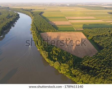 River with boats on the Tisza. Aerial photography. Concept for tourism and travel.