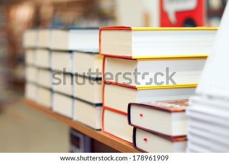 Stacks of books in the bookstore Royalty-Free Stock Photo #178961909