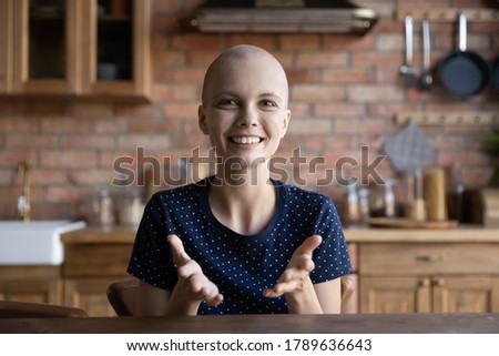 Headshot picture portrait of smiling young Caucasian sick woman blogger shoot online live broadcast vlog, happy ill hairless female patient with cancer oncology feel optimistic talk on video call