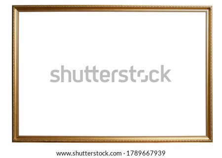 Ornamented golden picture frame. isolated on white background with clipping path