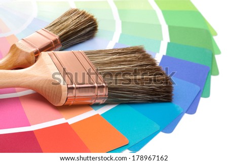 two brushes on a palette color guide