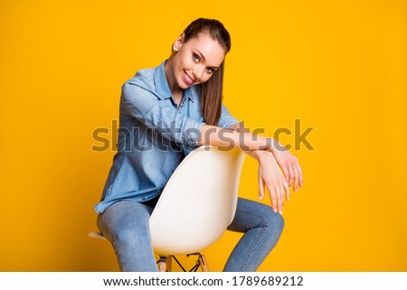 Photo of content nice attractive women sit chair look good in camera toothy smile wear casual style clothes isolated over vivid color background