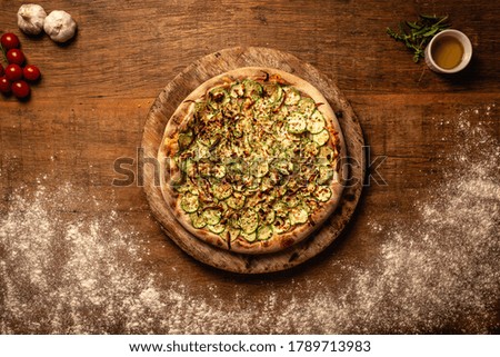 Top down pizza on wooden table for restaurant menu