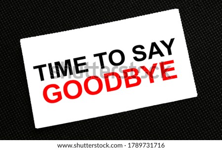 White card on the black background with text Time to Say Goodbye. Business conzept