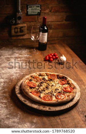 Delicious italian pizza on wood table