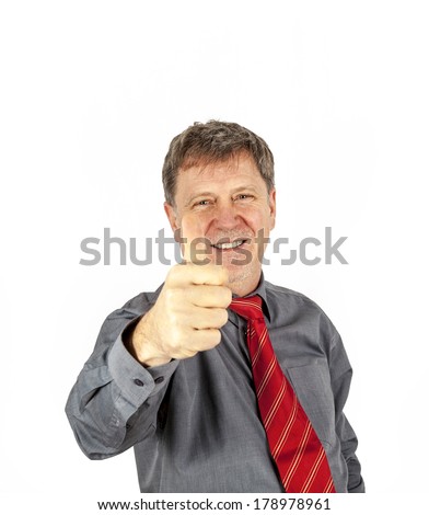 portrait of handsome business man with red tie showing thumbs up sign