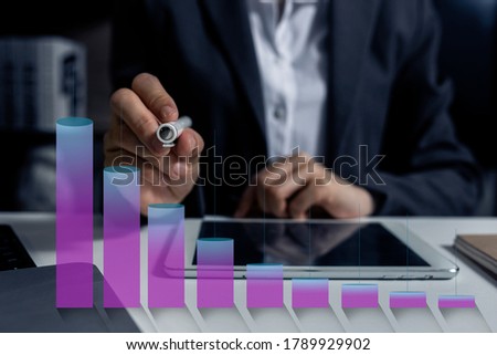Businesswoman working on smartphone with business financial chart diagram interface icons, Background toned image blurred.