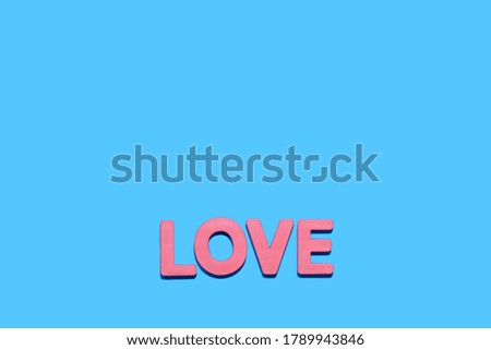love word alphabet on blue paper for background