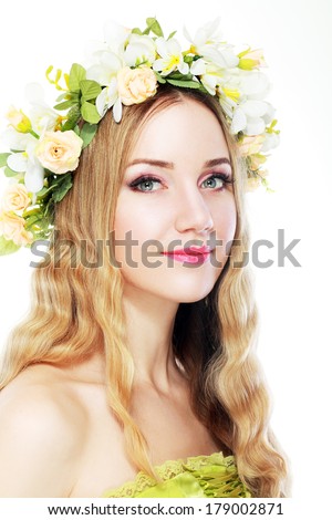spring beauty portrait girl with wreath of flowers , pastel shades 