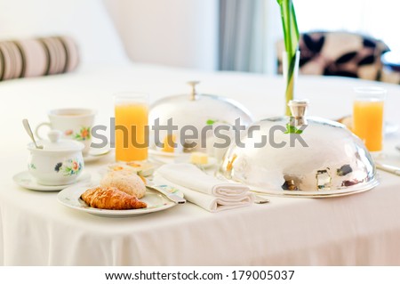 Delicious room service. Breakfast. Royalty-Free Stock Photo #179005037