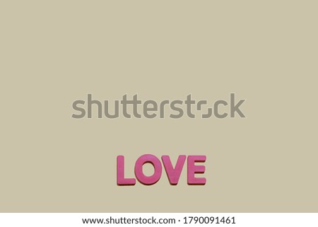 love word alphabet on light yellow paper for background