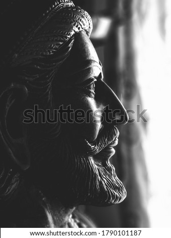 Side facing Black and white photo of Chhatrapati Shivaji Maharaj idol sculpture. Great indian warrior-king.
 Royalty-Free Stock Photo #1790101187