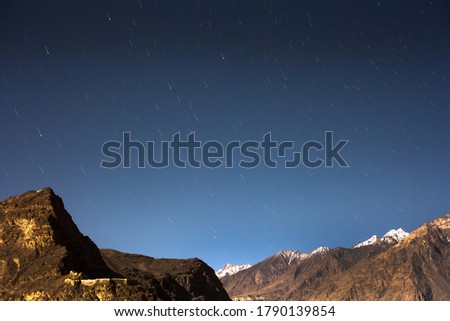 star trails and long exposure photography in mountain areas with sky and clouds in Pakistan  