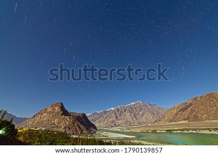 The Indus is a transboundary river of Asia and a trans-Himalayan river of South and East Asia,
star trails and long exposure photography in mountain areas with sky and clouds in Pakistan  