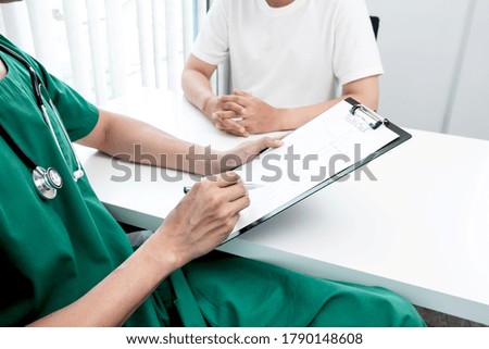 Male doctors explain and recommend treatment after a male patient meets a doctor and receives results regarding illness problems. Medical and health care concepts.