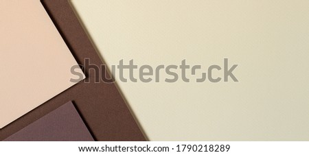Abstract color papers geometry composition banner background with beige and brown tones
