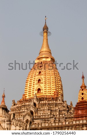 Portrait format picture of the stupa of a temple near Bagan in Myanmar