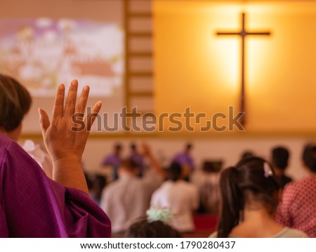 Asian people go to church for Sunday prayers,many people are worship to God.