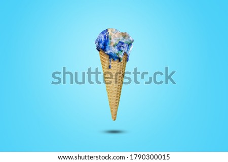 Global Warming and Pollution Concept : Ice cream planet earth melting in ice cream cone. (Elements of this image furnished by NASA.)