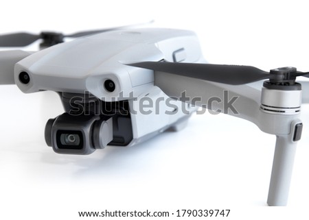 Gray mini drone on a white background, isolated. 