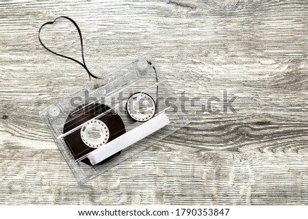 Retro old cassette on a wooden desk