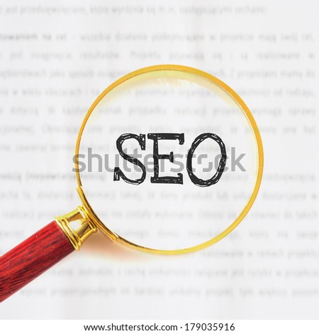 Classic styled magnifying glass, with SEO sign