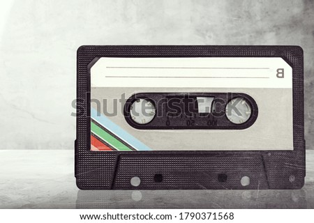 Retro old cassette on a marble desk.