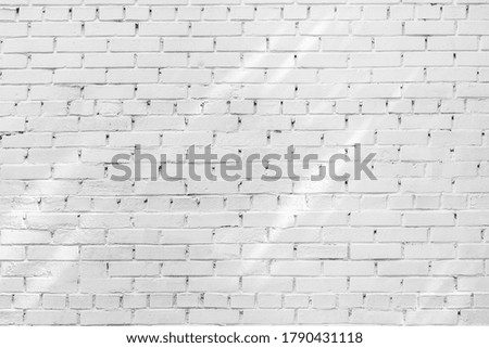 The background of the old white brick wall for design interior 