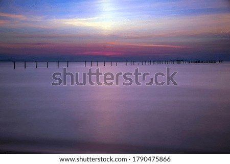 Sunset pillars ocean Virginia Beach