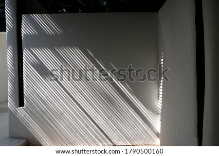 pattern of Sunlight shade on white wall
