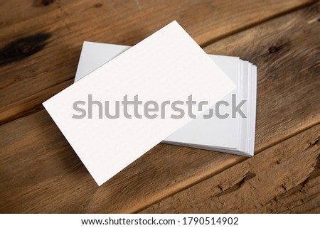 Blank business card on wood template mockup