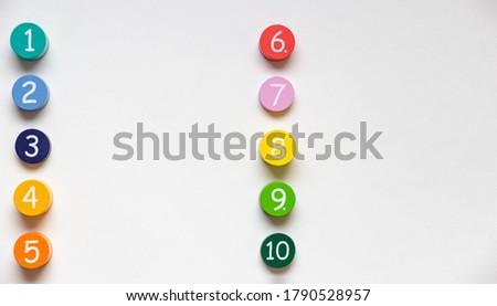 Colorful number blocks evenly placed in two vertical columns. Can be used for illustration of ordered list.